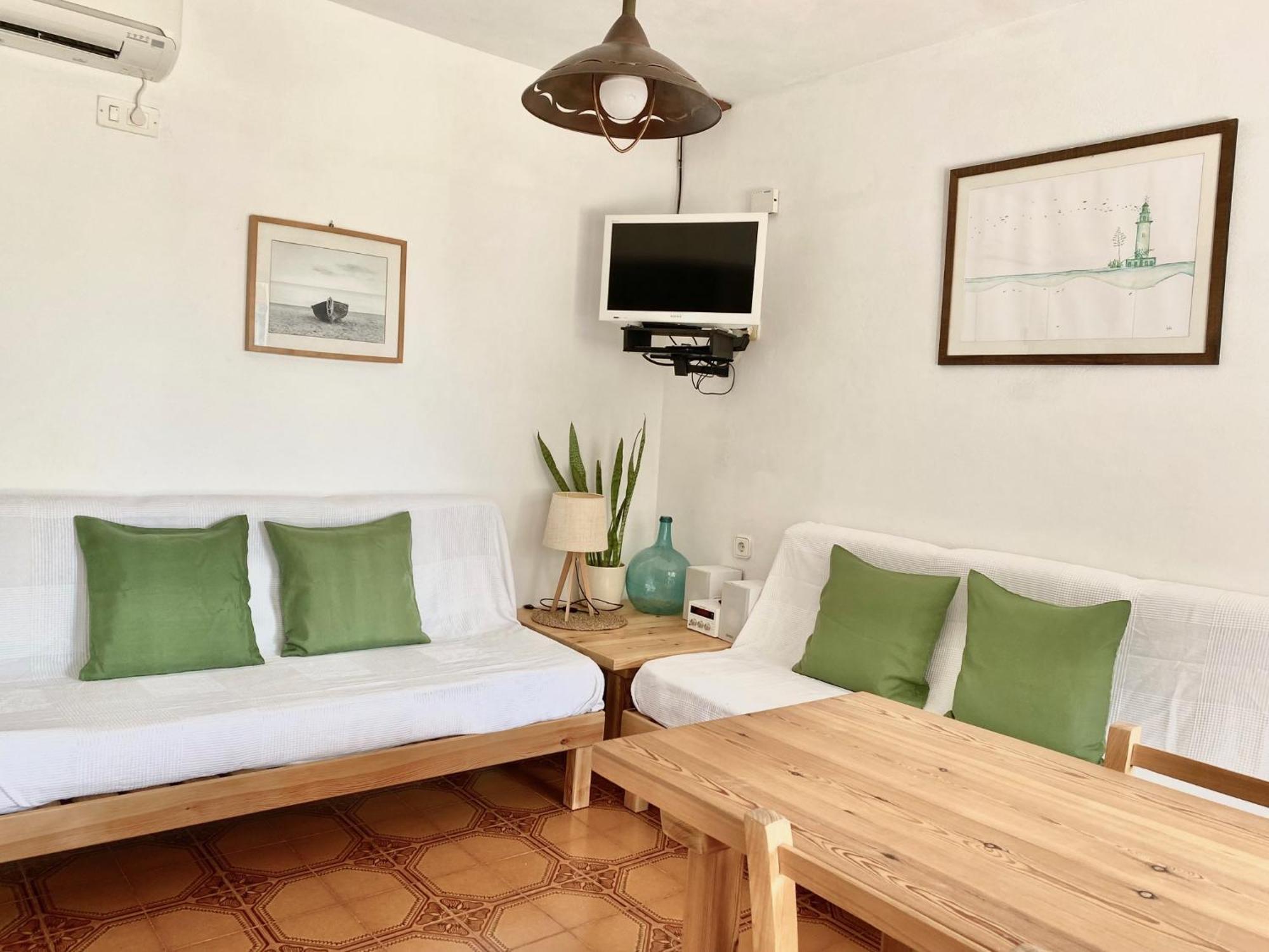 Apartamentos Laura Playa De Migjorn Eksteriør bilde